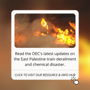 Train on fire with flames and smoke engolfing it. Text reads " Read the OEC's latest updates on the East Palestine train derailment and chemical disaster."