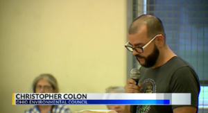 Chris Colon speaking at town meeting