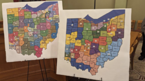 Picture of two large legislative district maps. Photo credit: Cleveland.com