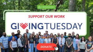 Giving Tuesday with OEC Staff in foreground and a donate button