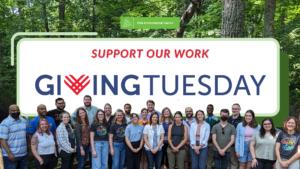 "support our work this Giving Tuesday" with OEC Staff in the foreground.